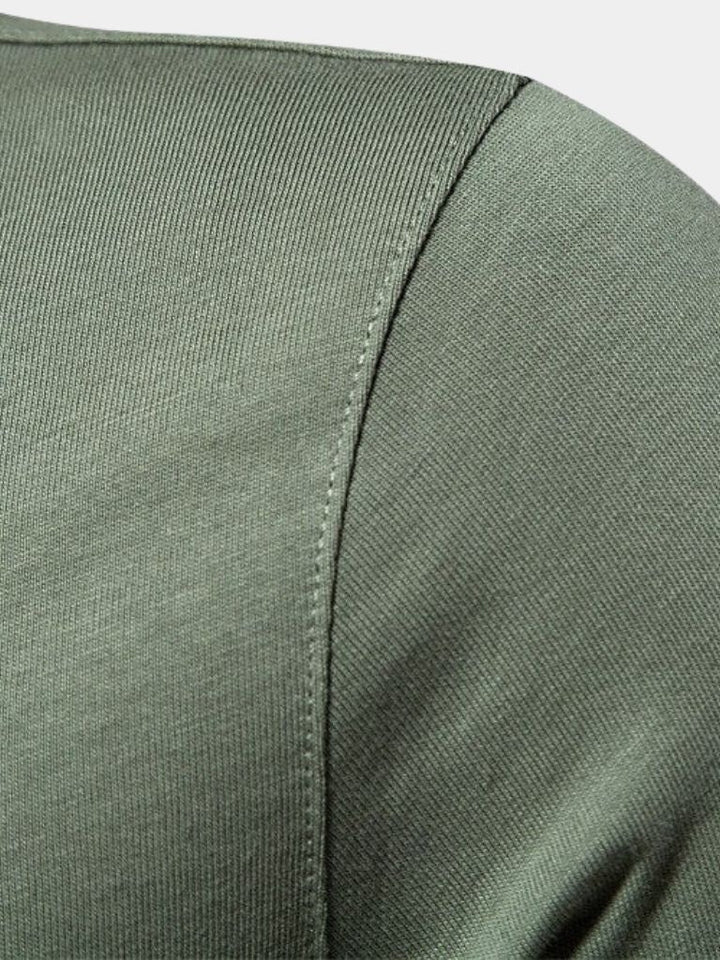 Mathias™ | Polo com Emblema Real